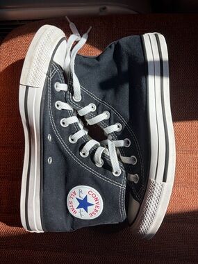 Black high top Converse women’s size 8 men’s 6